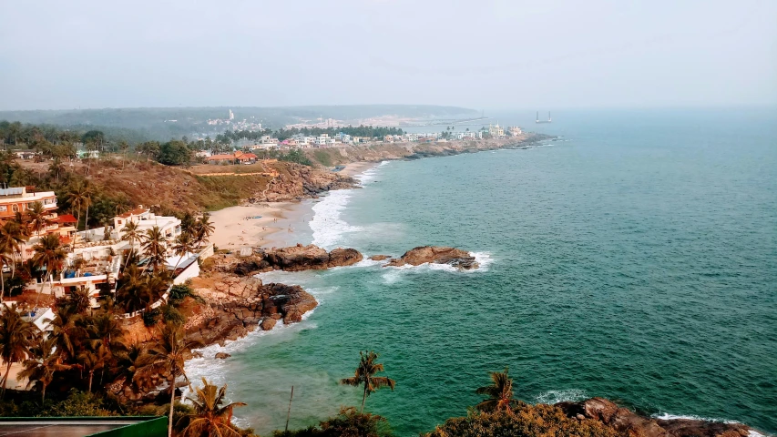 a long stretch of shore next to the beach