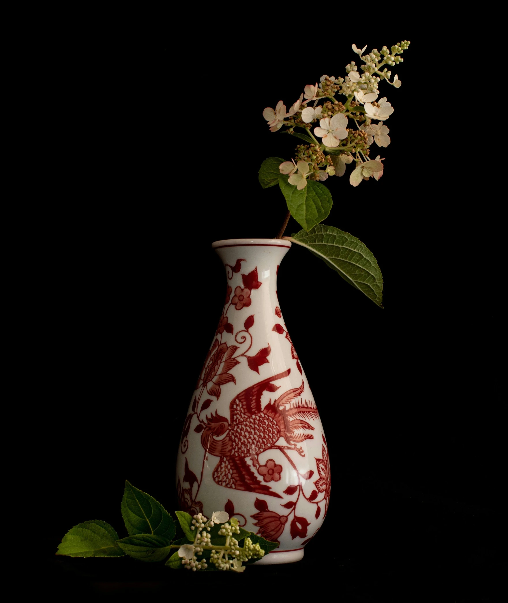 there is a vase that has flowers in it