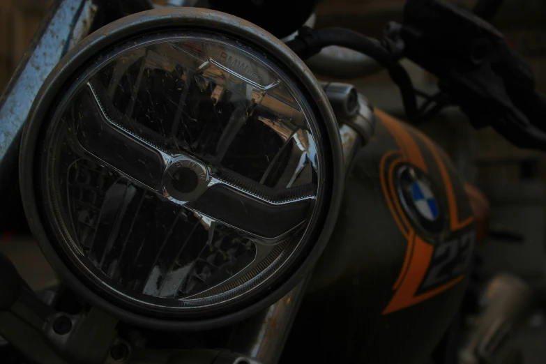 a close up of a motorcycle headlight with no lights