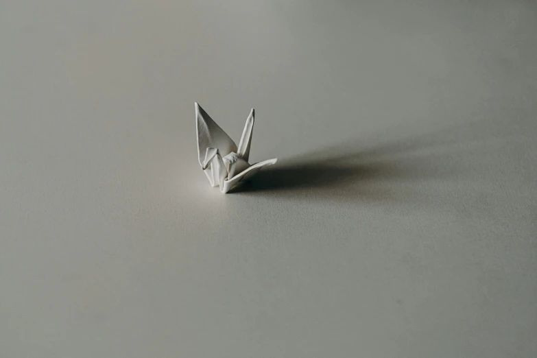 this is an image of a small origami bird