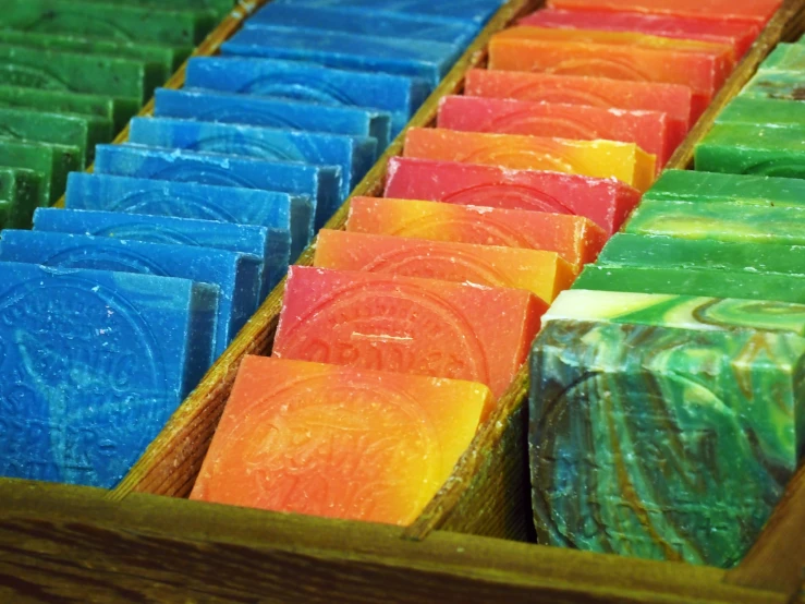 some very pretty colored soaps in a box
