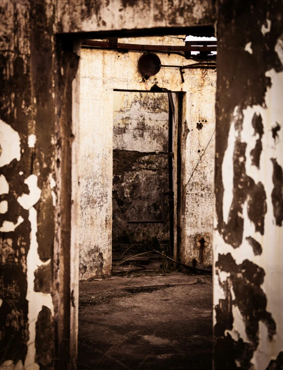 a small doorway with graffiti all over the walls