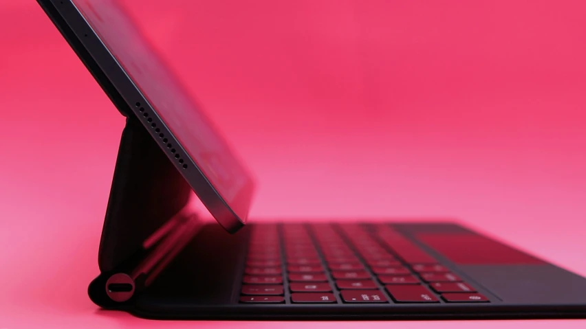 an open laptop computer sitting on top of a table