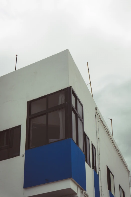 an image of a building that looks like it has blue and white stripes on it