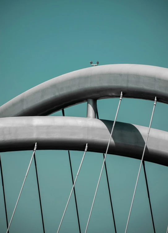 the edge of a bridge, which has been modified to resemble an arch