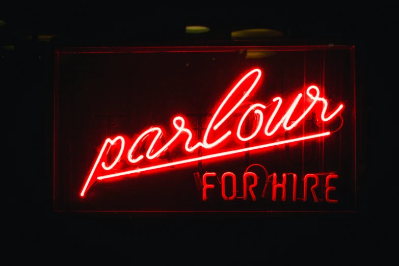 an illuminated sign that reads bar tour for hire