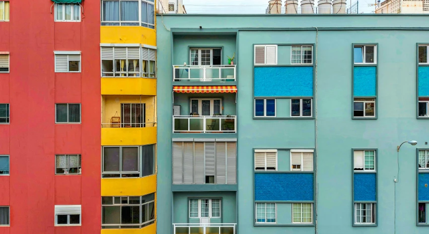 a building with multiple windows in front of it