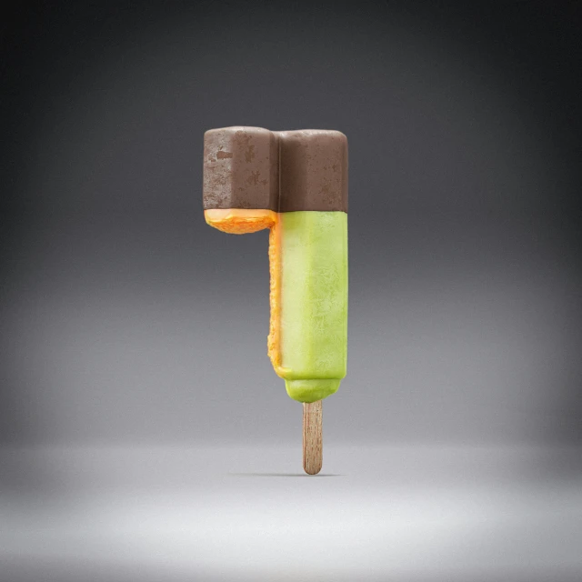 two colorful popsicles that have been placed on top of each other