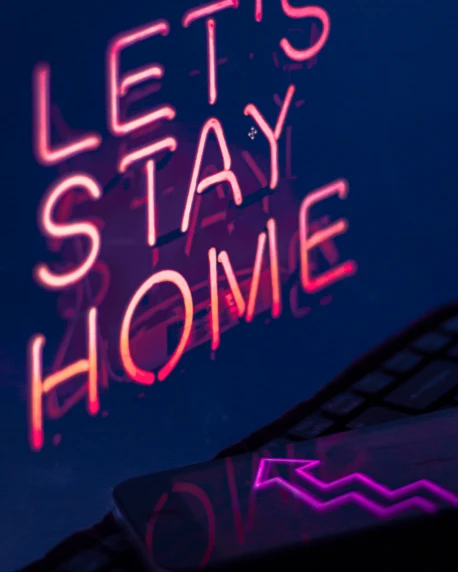 a neon sign that says lets stay home