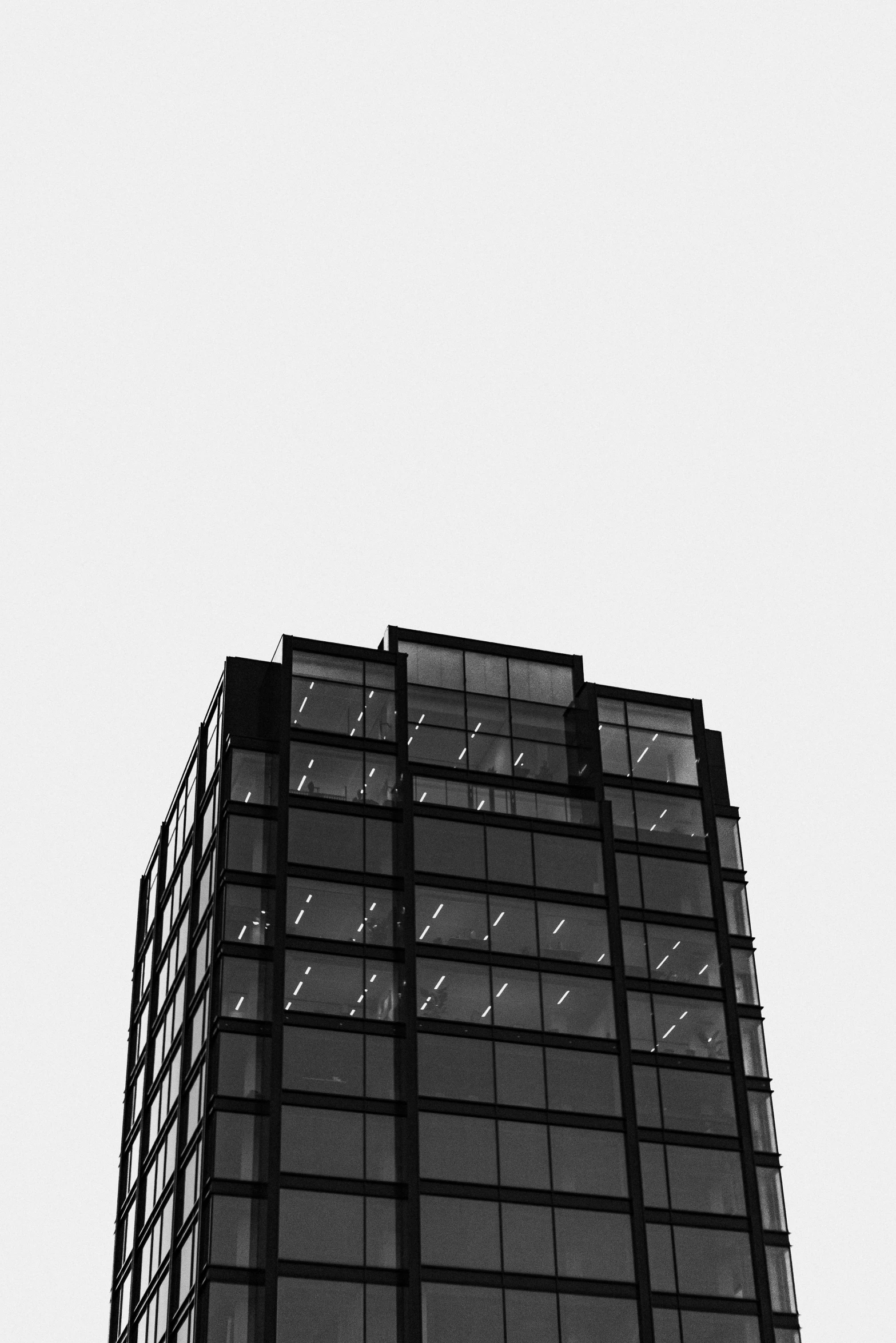 black and white image of the top of a building