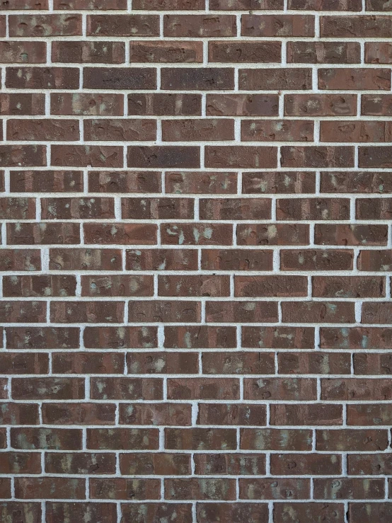 an abstract po of a brick wall with a red stop sign on it