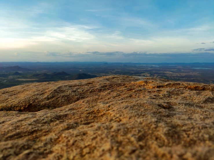 a view of the countryside from top of a mountain