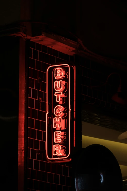 an asian restaurant sign that is red on display