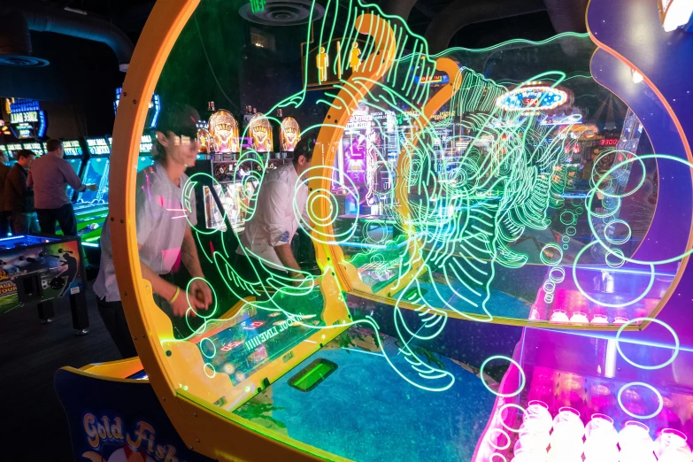 a close up of many people inside a pin ball game