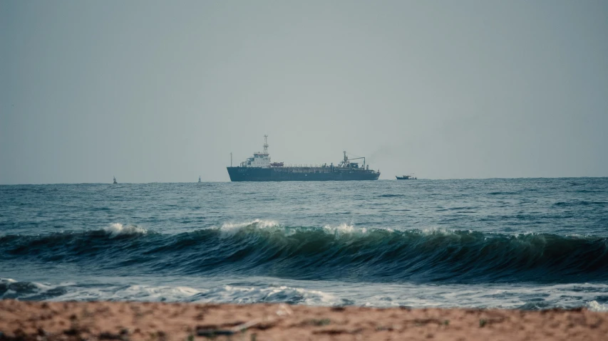 a large boat traveling out into the ocean