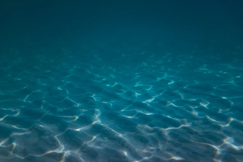 water that is very blue with a small amount of bubbles