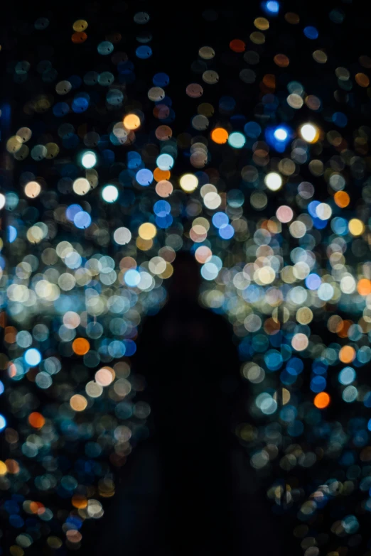 an abstract image of several circles and a person silhouette