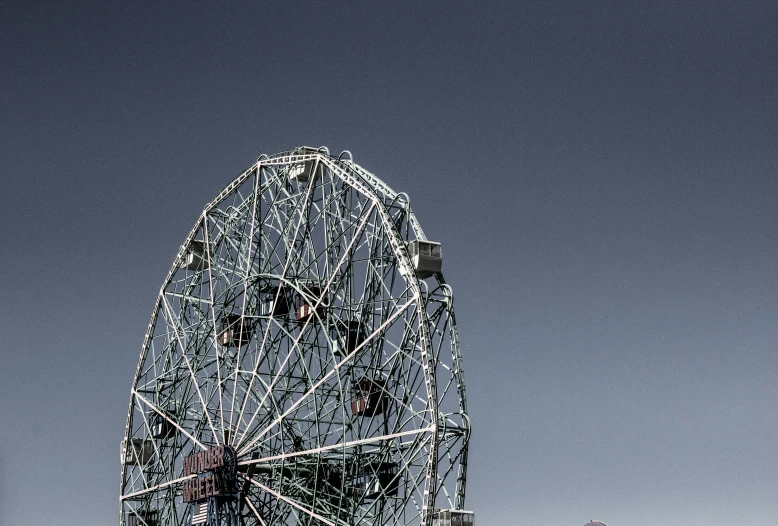 an image of a ferris wheel at a fair