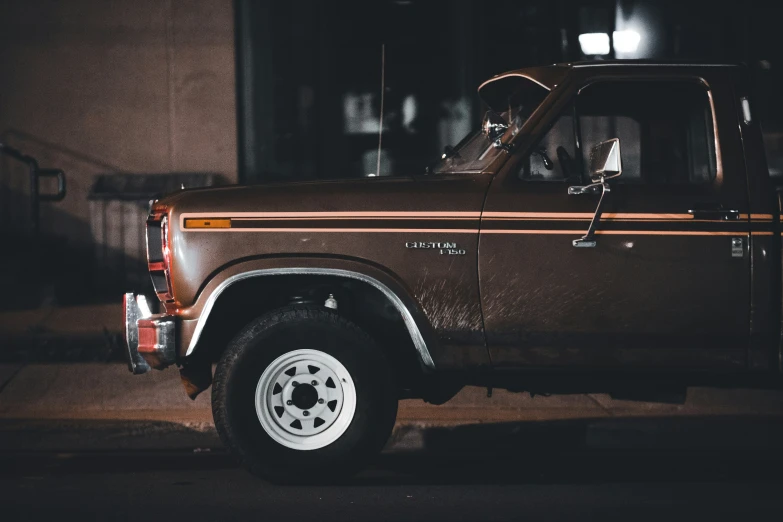 a large brown truck parked in front of a building