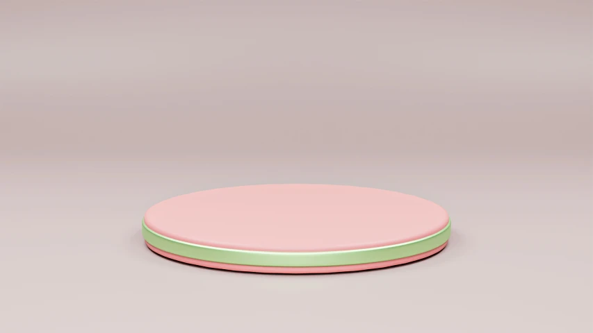 an empty, pink and green object with one object in the middle
