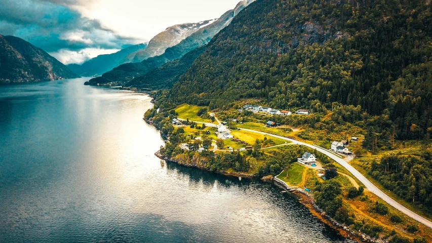 an aerial view of a winding coast in the middle of nowhere