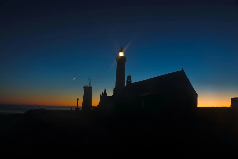 the view of a light house through the window