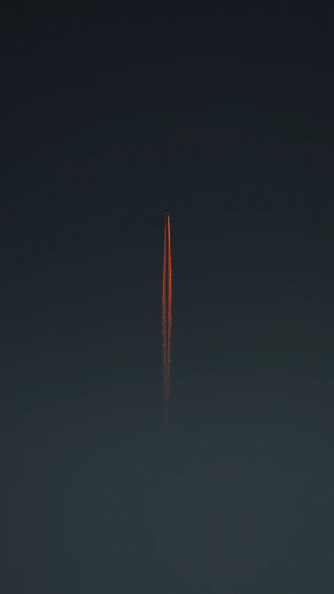a view of some airplane streak in the sky