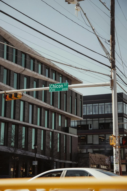 an intersection at north nothing street with power lines above it