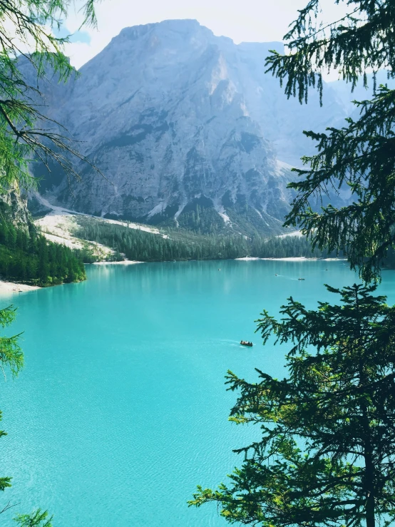 water near the shore is bright blue in the daytime