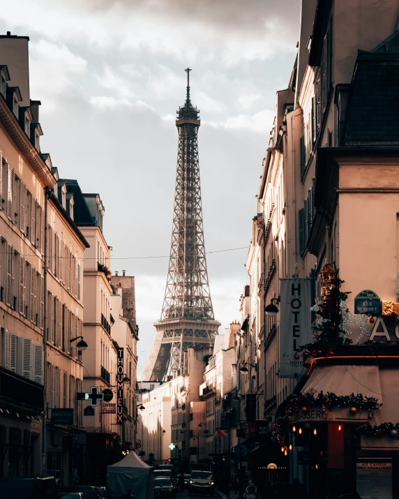 the eiffel tower is visible from the city streets