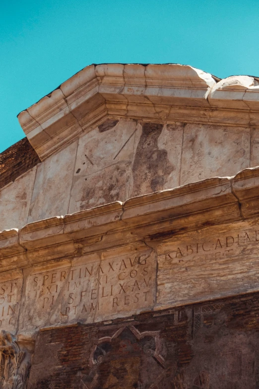 close up of carvings on stone above entrance to building