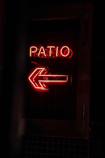 a red arrow lit up and the words ratto on it