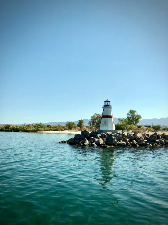 a light house on top of a body of water