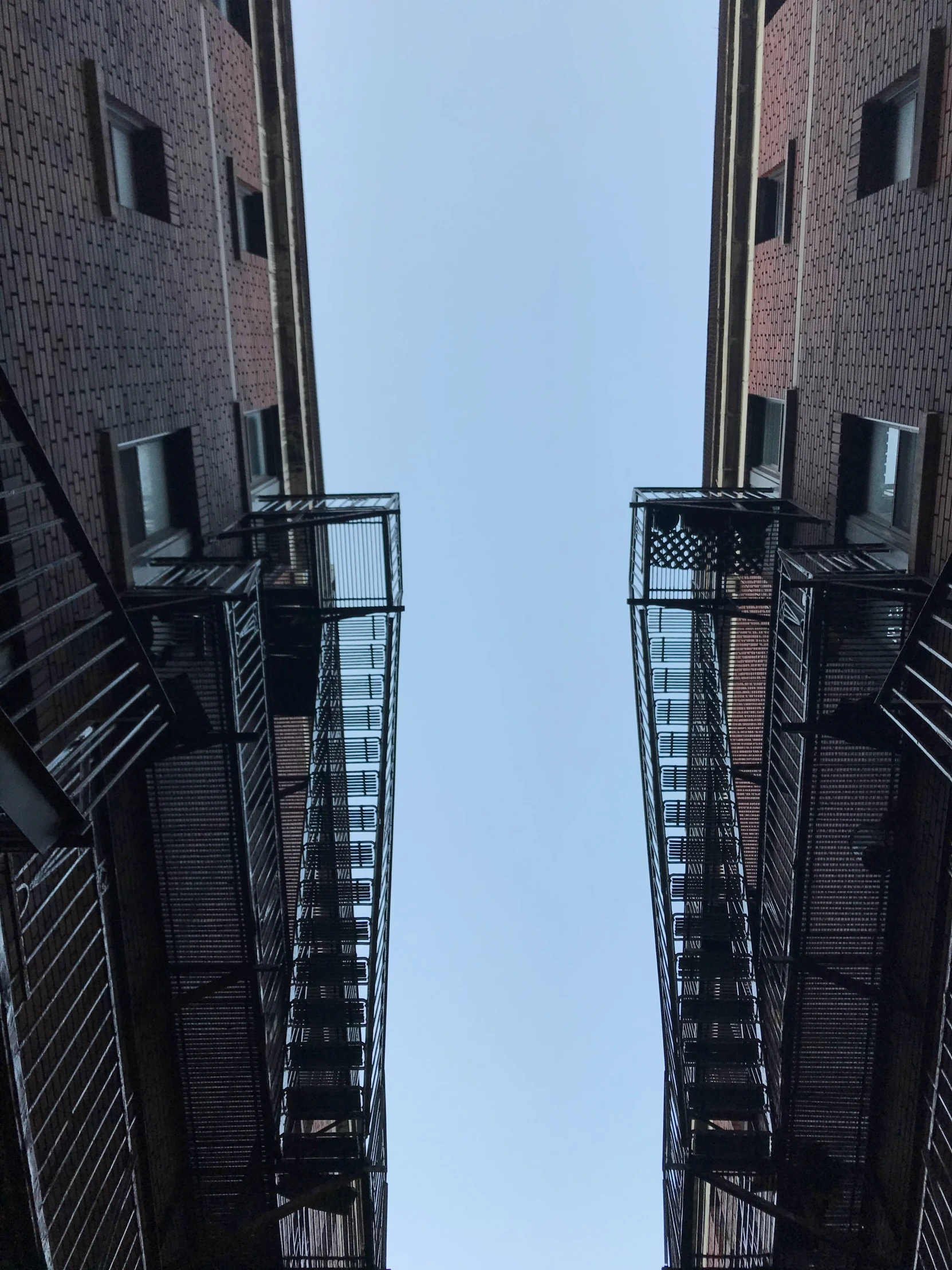 a bunch of steps in between two buildings