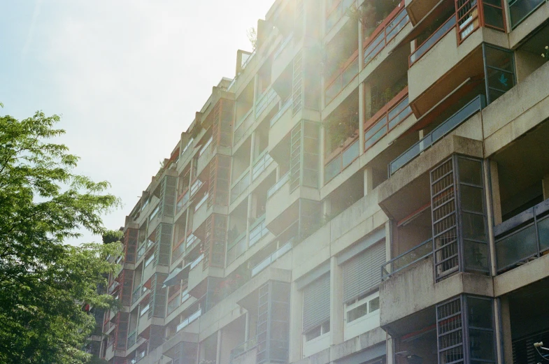 a motorcycle parked in front of a building on a sunny day