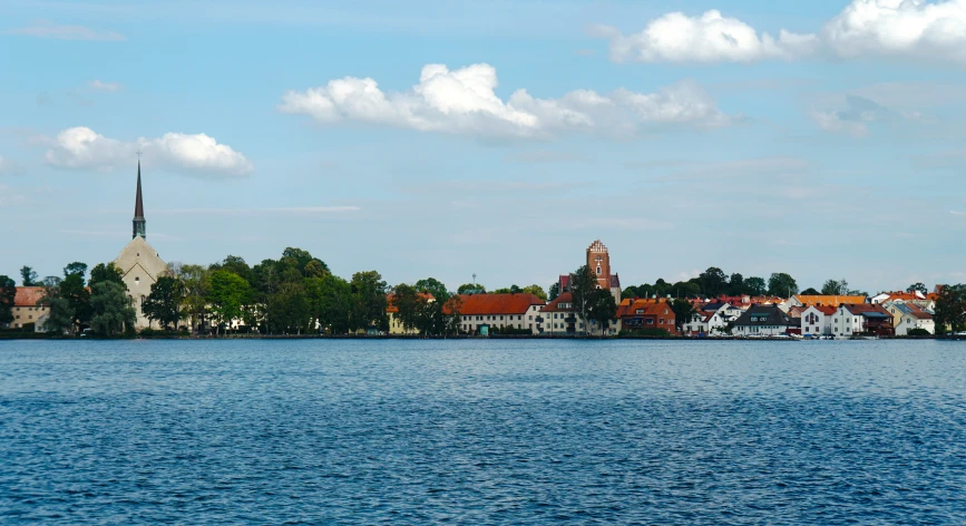 a city across the water from the ocean