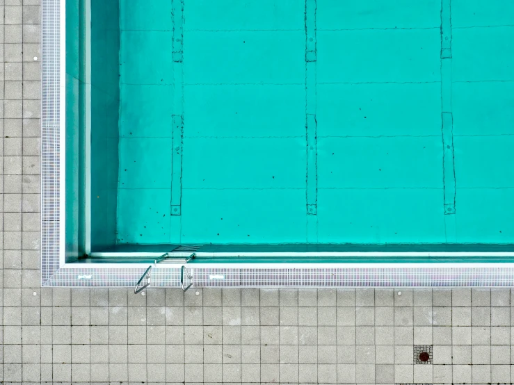 an overhead s of a swimming pool in a building