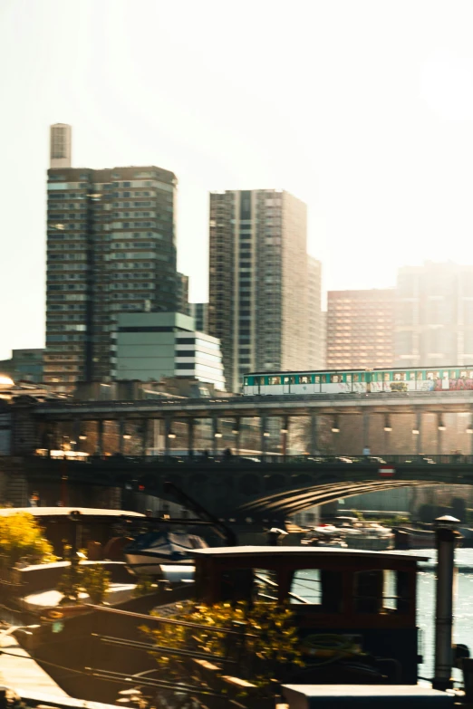 there is a train going on a bridge over water