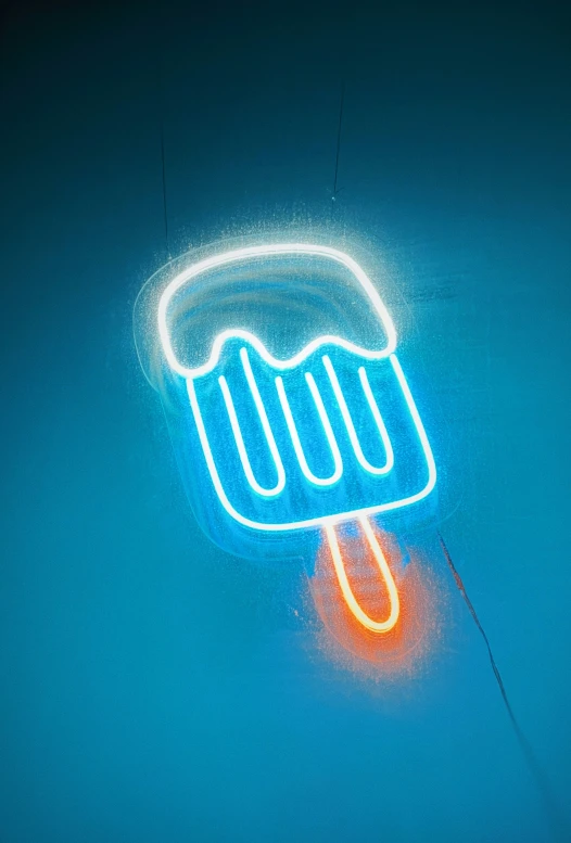 a neon sign in the middle of a wall