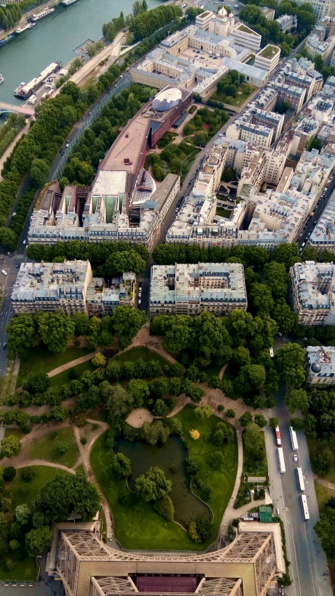 an aerial view of several parking spaces near the water