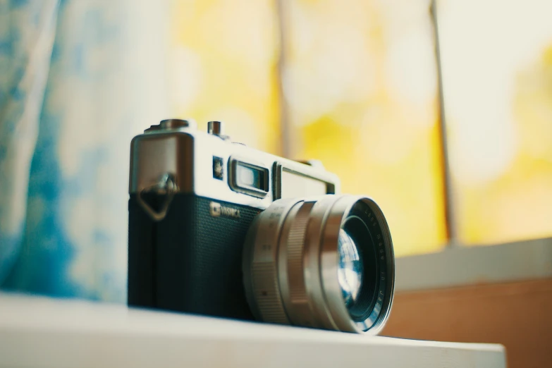 a camera is shown sitting on top of a table