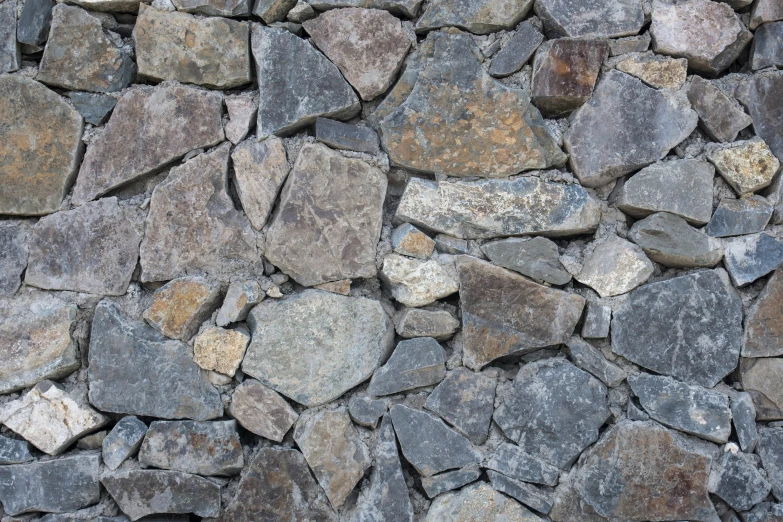 a bunch of stones on a wall