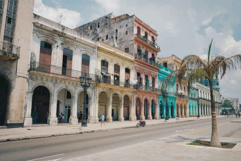 an image of a city street with many buildings