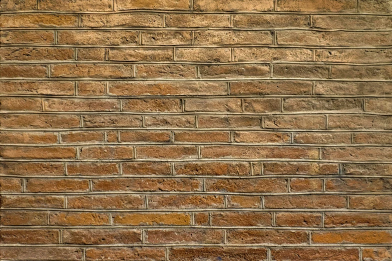 a brick wall with two green fire hydrants