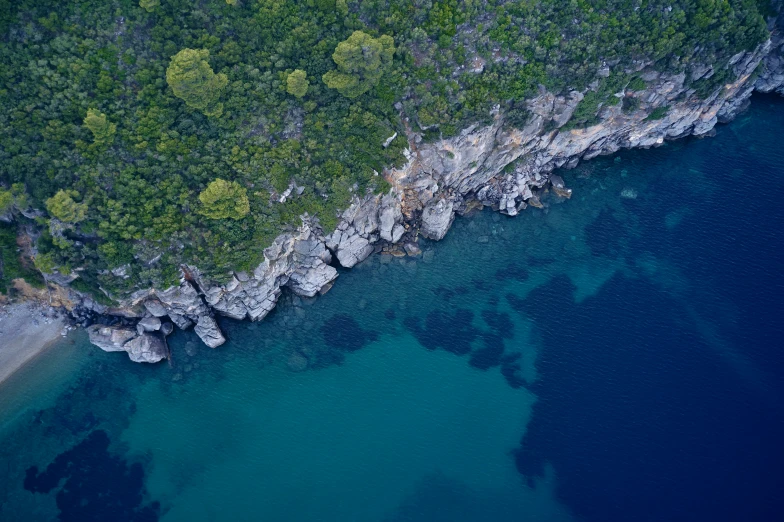 the island in the middle of the sea looks like it is on land