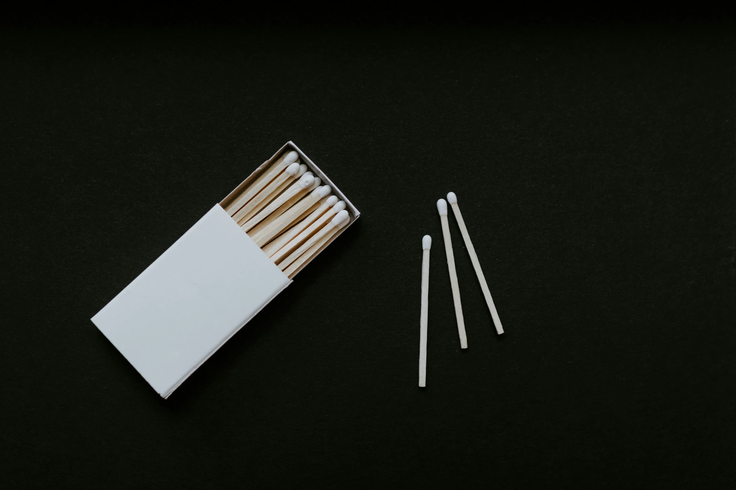 a set of four matches and one box of matches