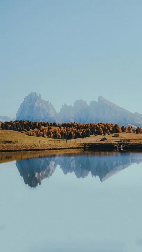 a scenic view of some mountains and a lake