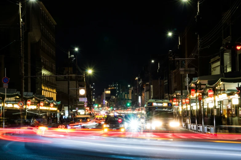 busy city street at night in the city