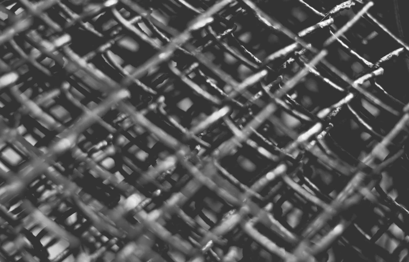 a black and white po of an abstract wire mesh