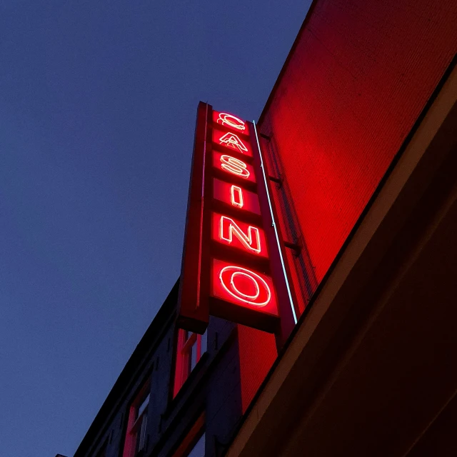 neon signs are visible on the side of a building